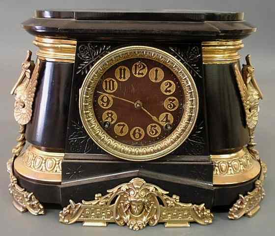 Appraisal: Ansonia black metal mantel clock with brass colored metal fittings