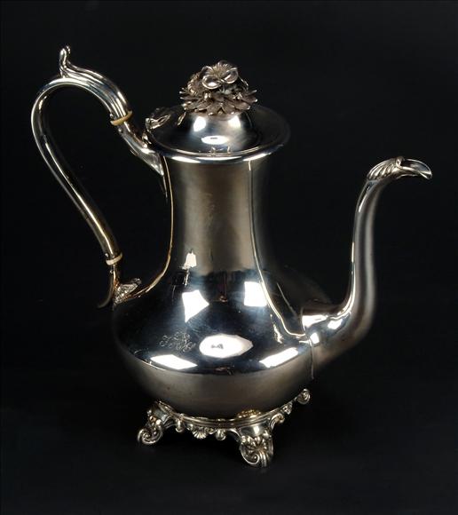 Appraisal: A Victorian silver baluster coffee pot by James Dixon Son