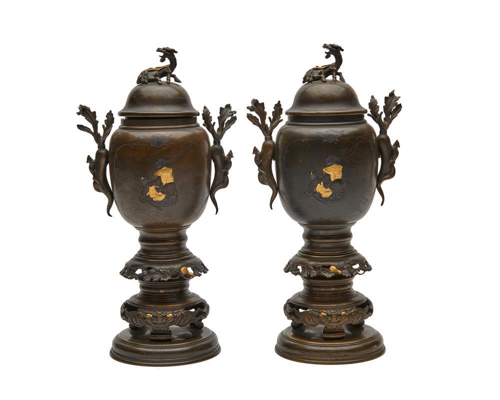 Appraisal: Pair of Japanese Patinated and Gilt Bronze Covered Censors with