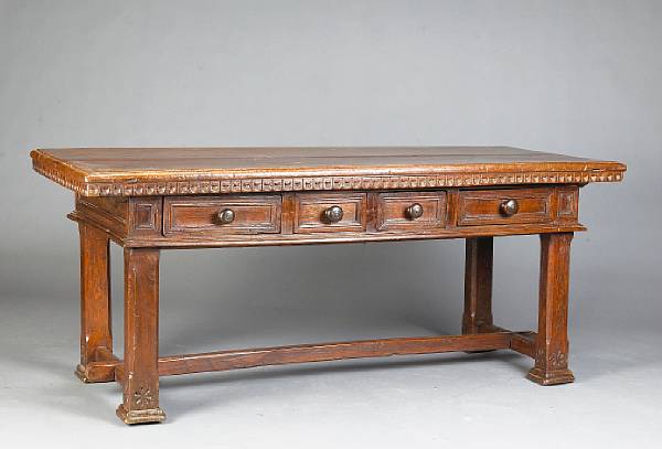 Appraisal: An Italian Baroque chestnut and walnut table late th early