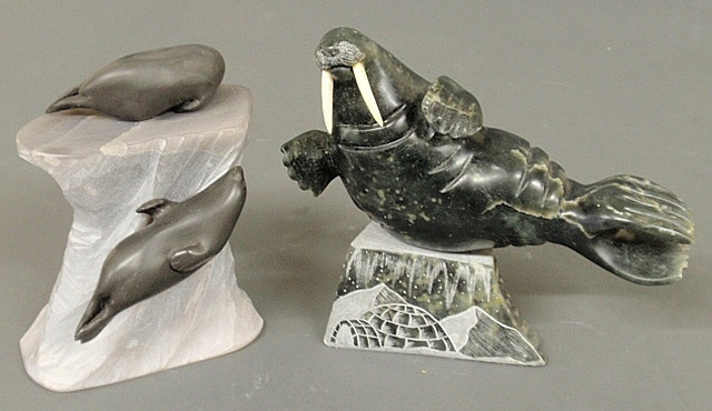 Appraisal: - Two Inuit carved stone sculptures- two seals mounted on