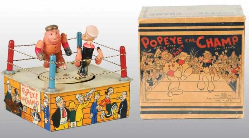 Appraisal: Tin Marx Popeye The Champ Wind-Up Toy Description American Working