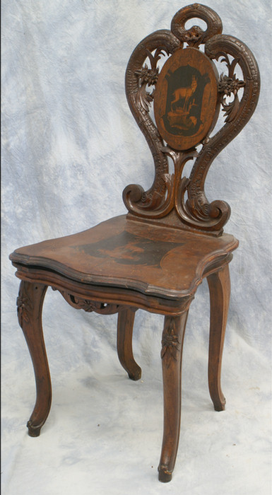 Appraisal: Inlaid walnut Black Forest musical chair with stag inlay lift