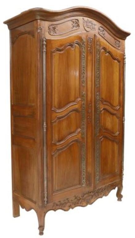 Appraisal: French Provincial walnut armoire th c arched cornice over frieze