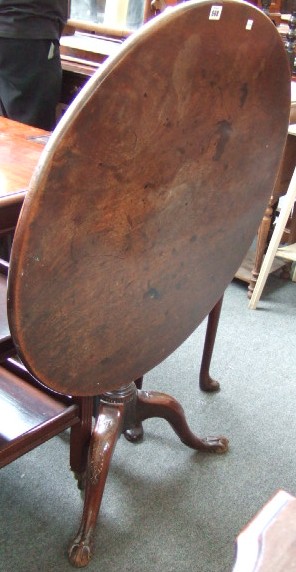 Appraisal: An th century and later mahogany occasional table the circular