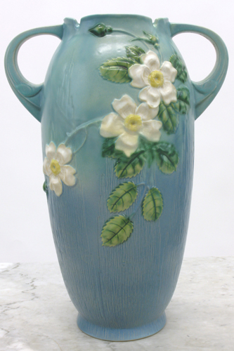 Appraisal: ROSEVILLE POTTERY TWIN-HANDLED VASE in the White Rose pattern on