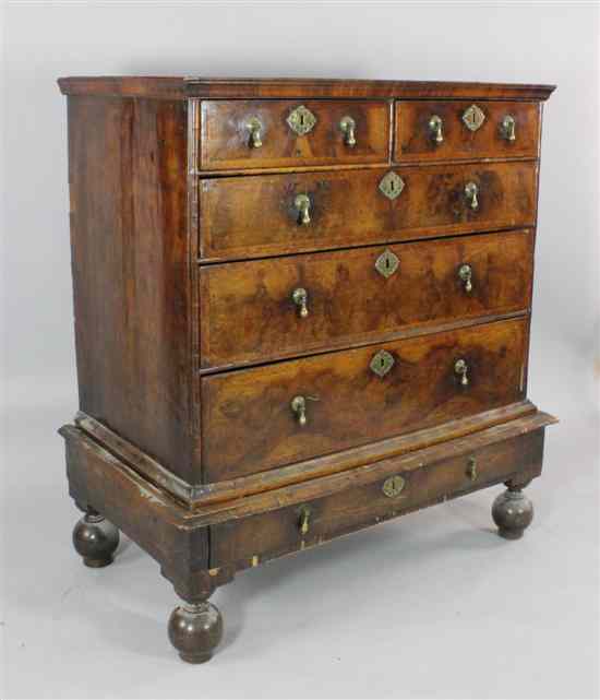 Appraisal: An early th century walnut and herringbone crossbanded chest on