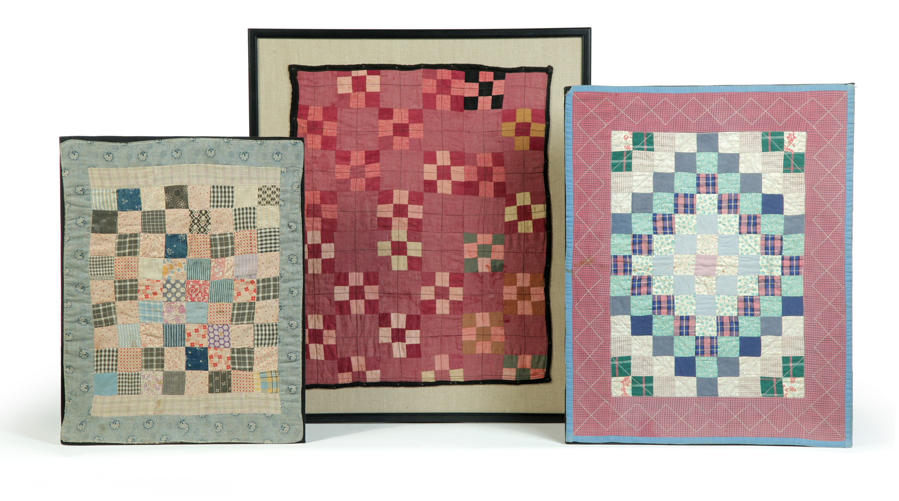 Appraisal: THREE FRAMED DOLL QUILTS American st half- th century Multicolored