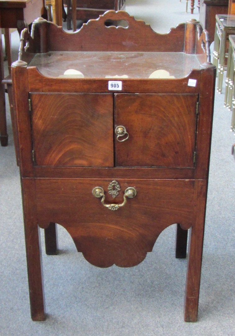 Appraisal: A George III mahogany tray top night stand with pair