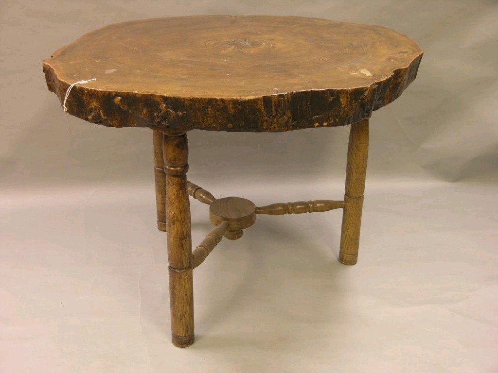 Appraisal: An elm table the in thick circular top on later