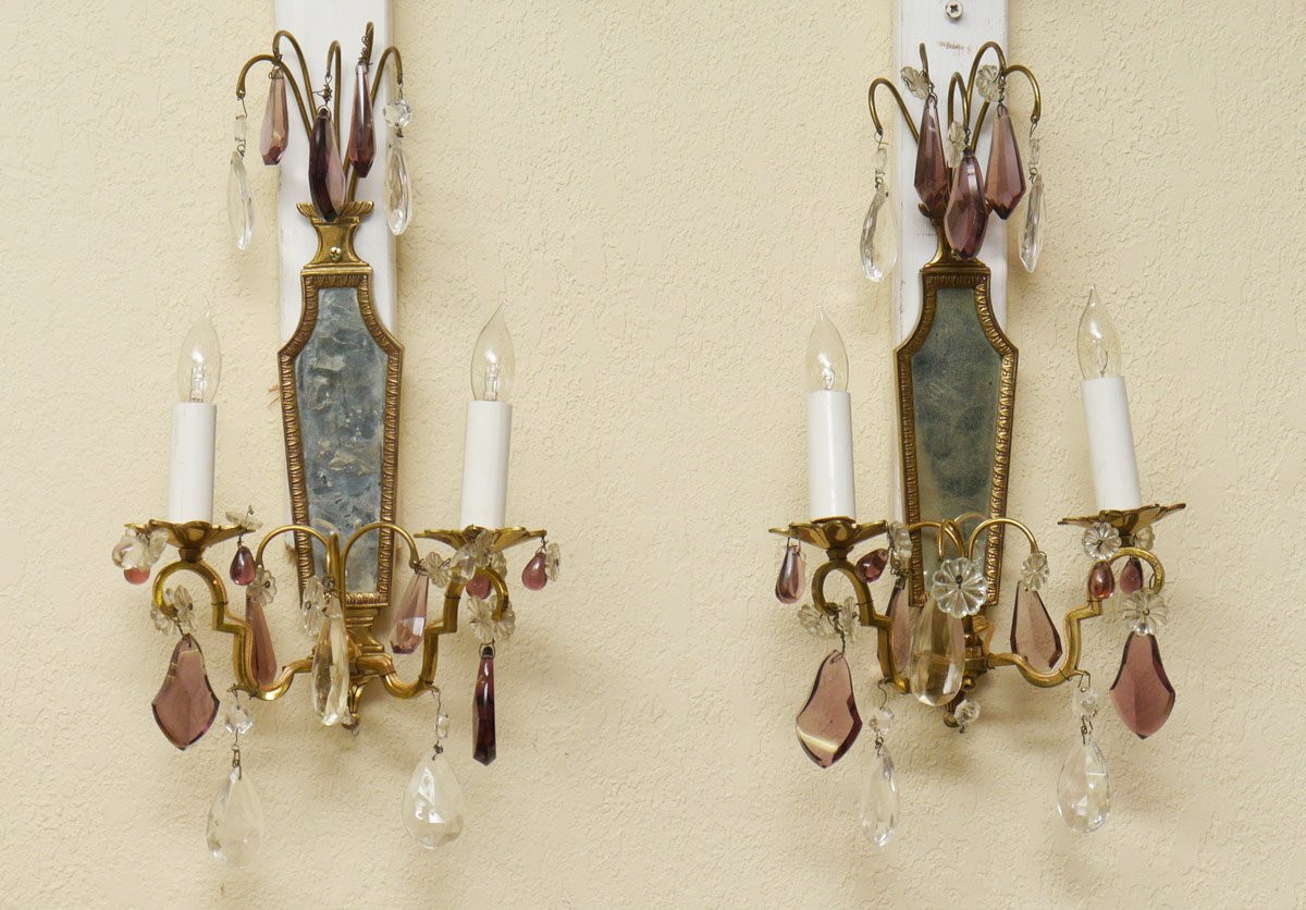 Appraisal: PAIR BRASS AND CRYSTAL LIGHT SCONCES Double light mirrored back