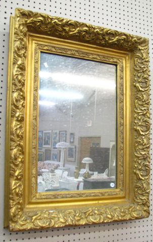 Appraisal: Carved and Gesso Wall Mirror x with gold leaf scroll