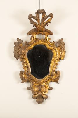 Appraisal: An Italian giltwood wall mirror of Baroque design with pierced