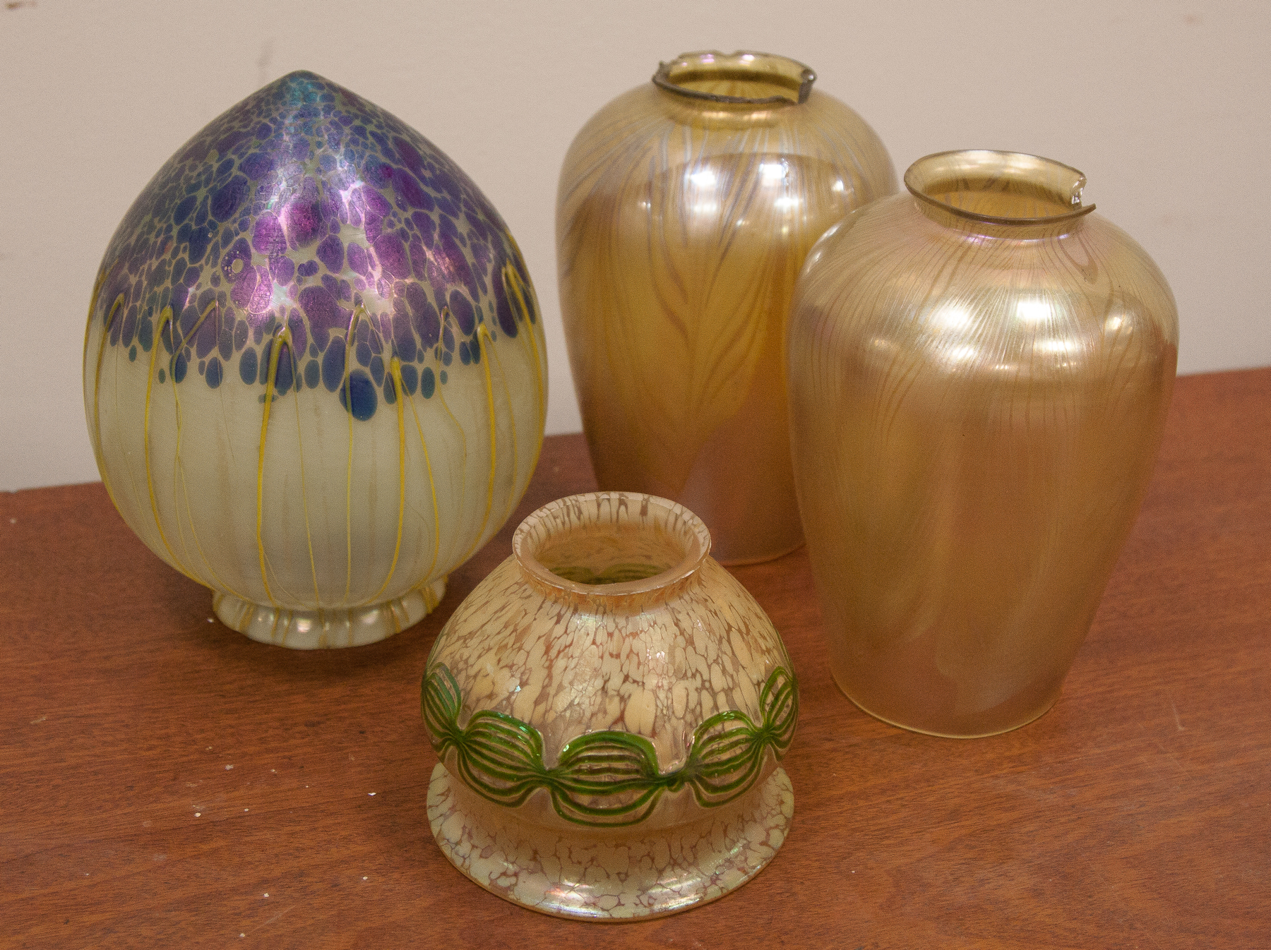 Appraisal: Four Art Glass Shades Loetz decorated shade crack near fitter