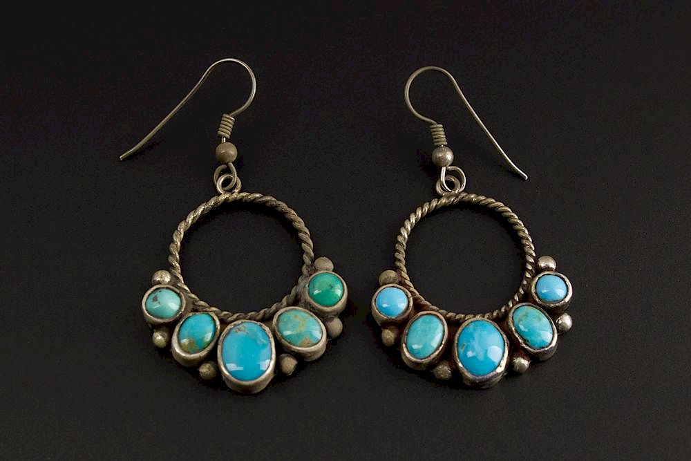 Appraisal: Navajo Turquoise Dangle Earrings Nicely patinaed Turquoise and Sterling Silver