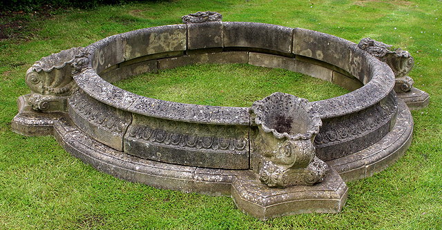 Appraisal: A HADDONSTONE CIRCULAR POND SURROUND with egg and dart decoration