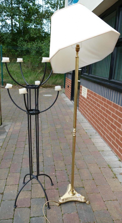 Appraisal: Modern brass standard lamp and wrought iron large candle stand