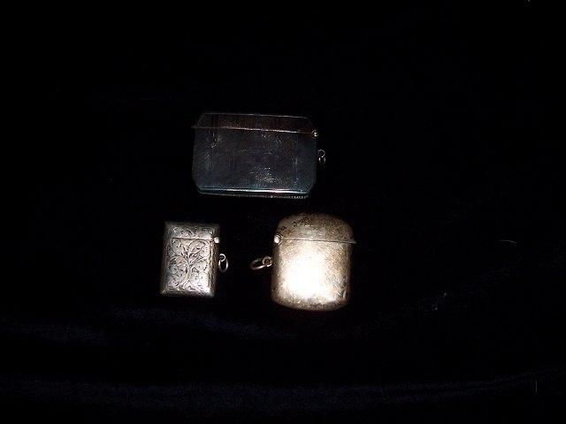 Appraisal: A vesta case of canted rectangular shape with engine turned