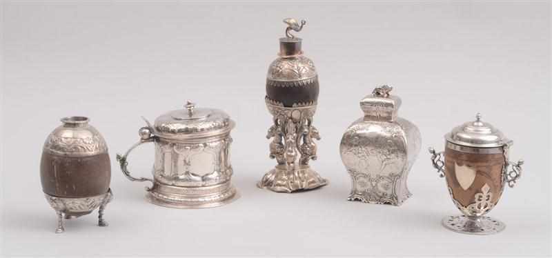 Appraisal: CONTINENTAL SILVER SMALL LIDDED TANKARD THREE SILVER-MOUNTED COCONUT SHELL ARTICLES