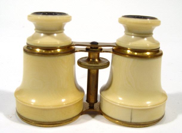 Appraisal: Pair of German adjustable ivory opera glasses in a leather