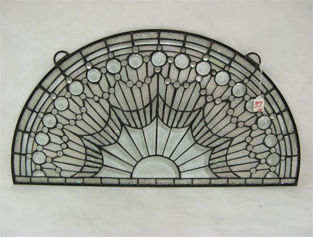 Appraisal: PAIR STAINED AND LEADED GLASS WINDOW PANELS of demilune form