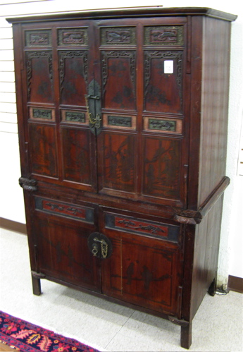 Appraisal: CHINESE MING-STYLE CABINET-ON-CABINET double panel doors above and below interior