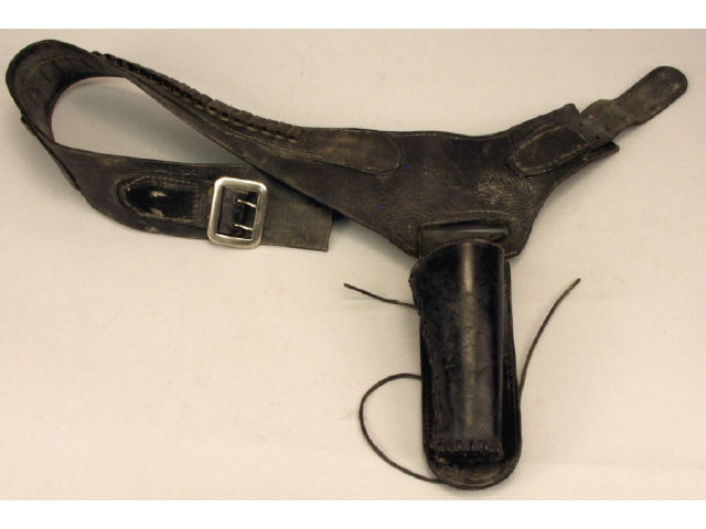 Appraisal: Unmarked black leather gun holster rig showing great character Estimate