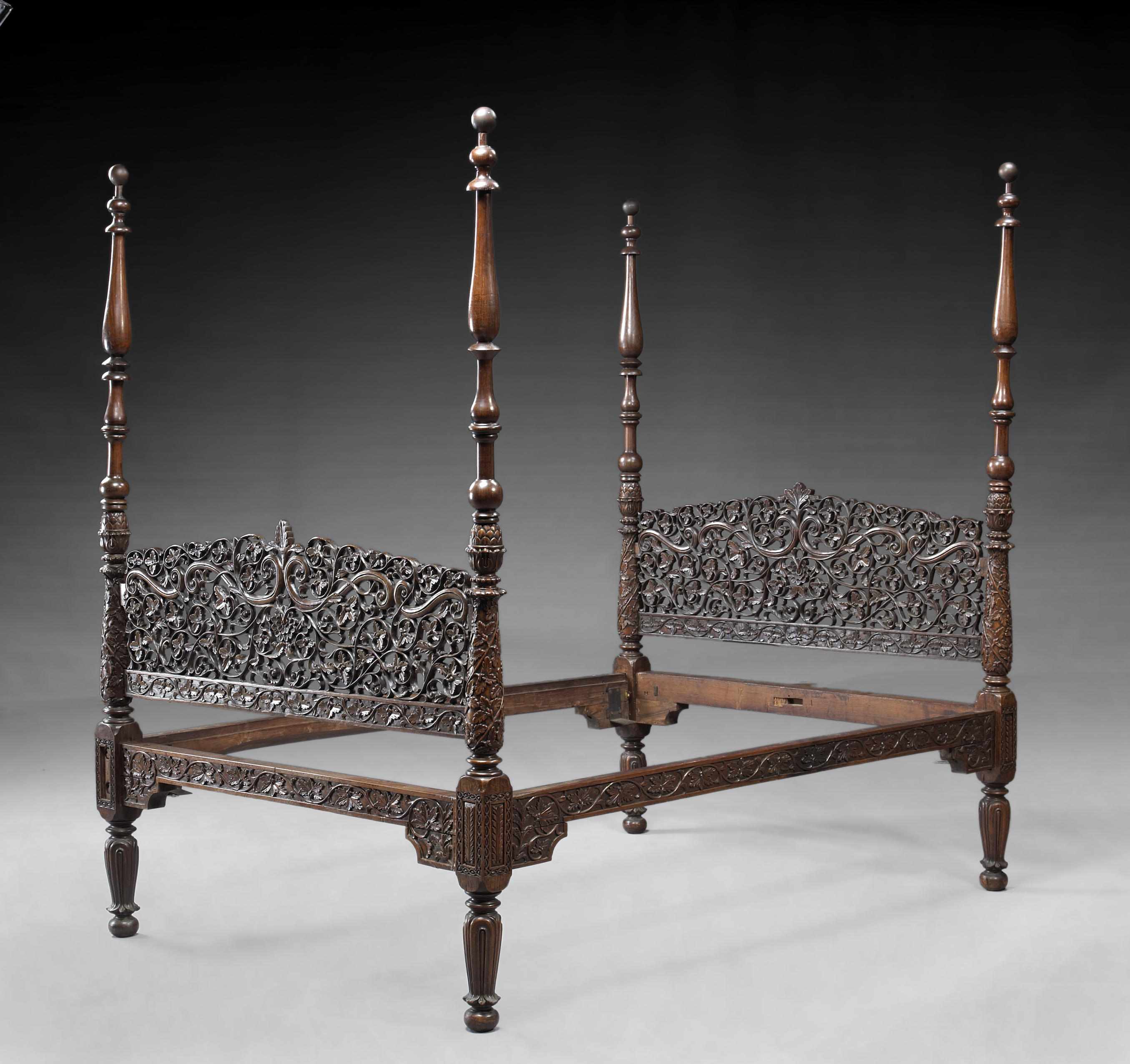 Appraisal: An Anglo Indian rosewood bed th century With pierced and