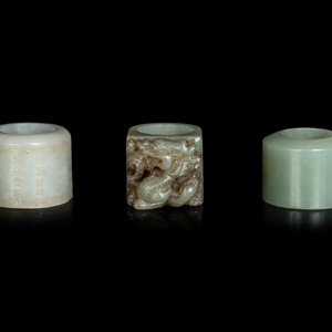 Appraisal: Three Chinese Celadon Jade Archer's Rings the first with gilt