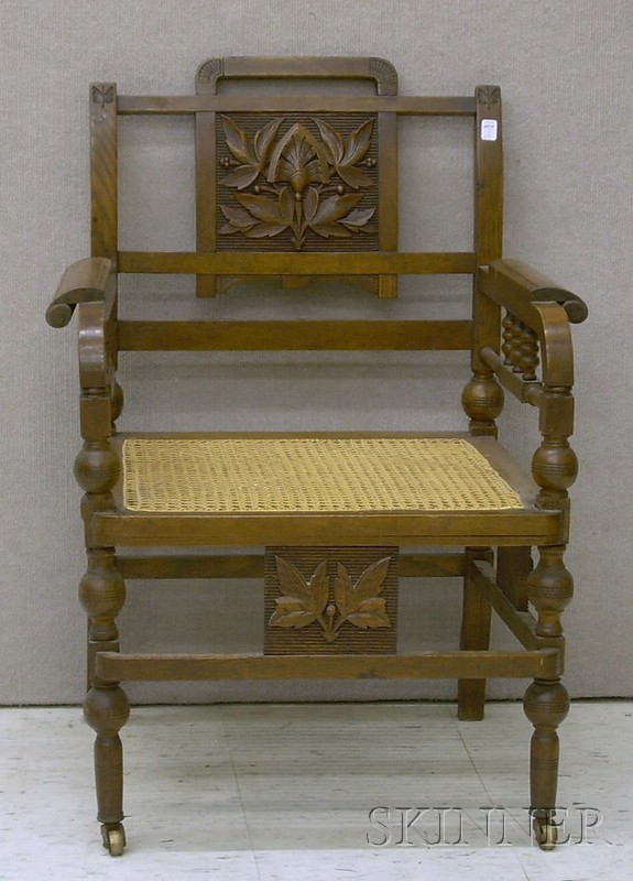 Appraisal: Victorian Aesthetic Caned Carved Oak Armchair