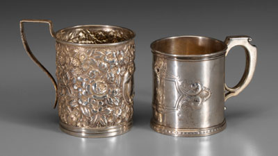 Appraisal: Two sterling children's mugs one with floral repousse decoration squared