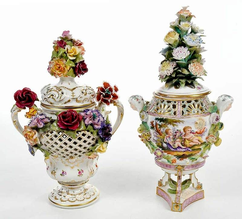 Appraisal: Two Floral Porcelain Lidded Potpourri Urns Continental th century reticulated