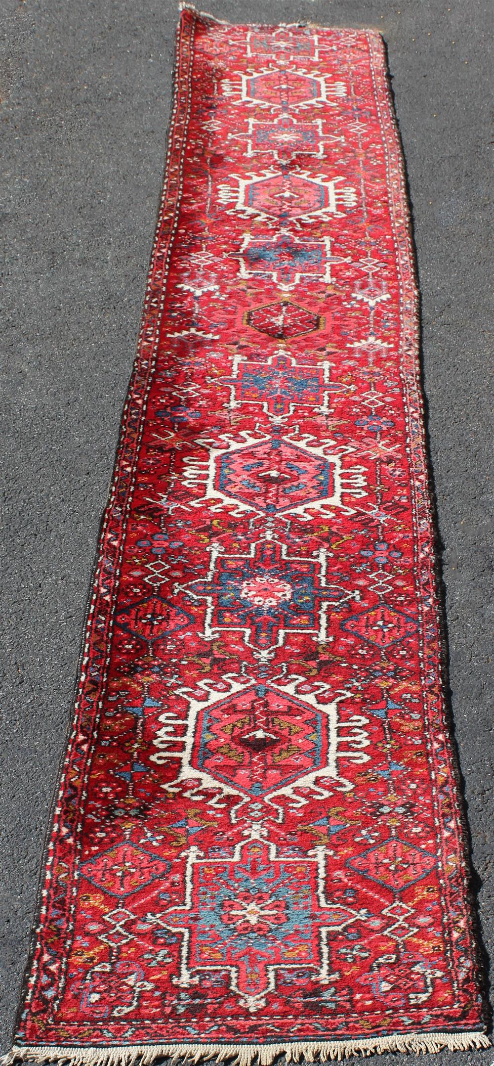 Appraisal: TWO IRANIAN RUGS INCLUDING A MALAYAR TRIBAL RUNNER Malayer with