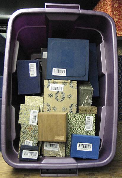 Appraisal: A group of small wood and fabric-covered cardboard storage boxes