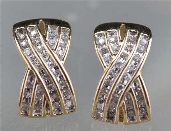 Appraisal: KT yellow gold Omega clip earrings with diamonds Each earring