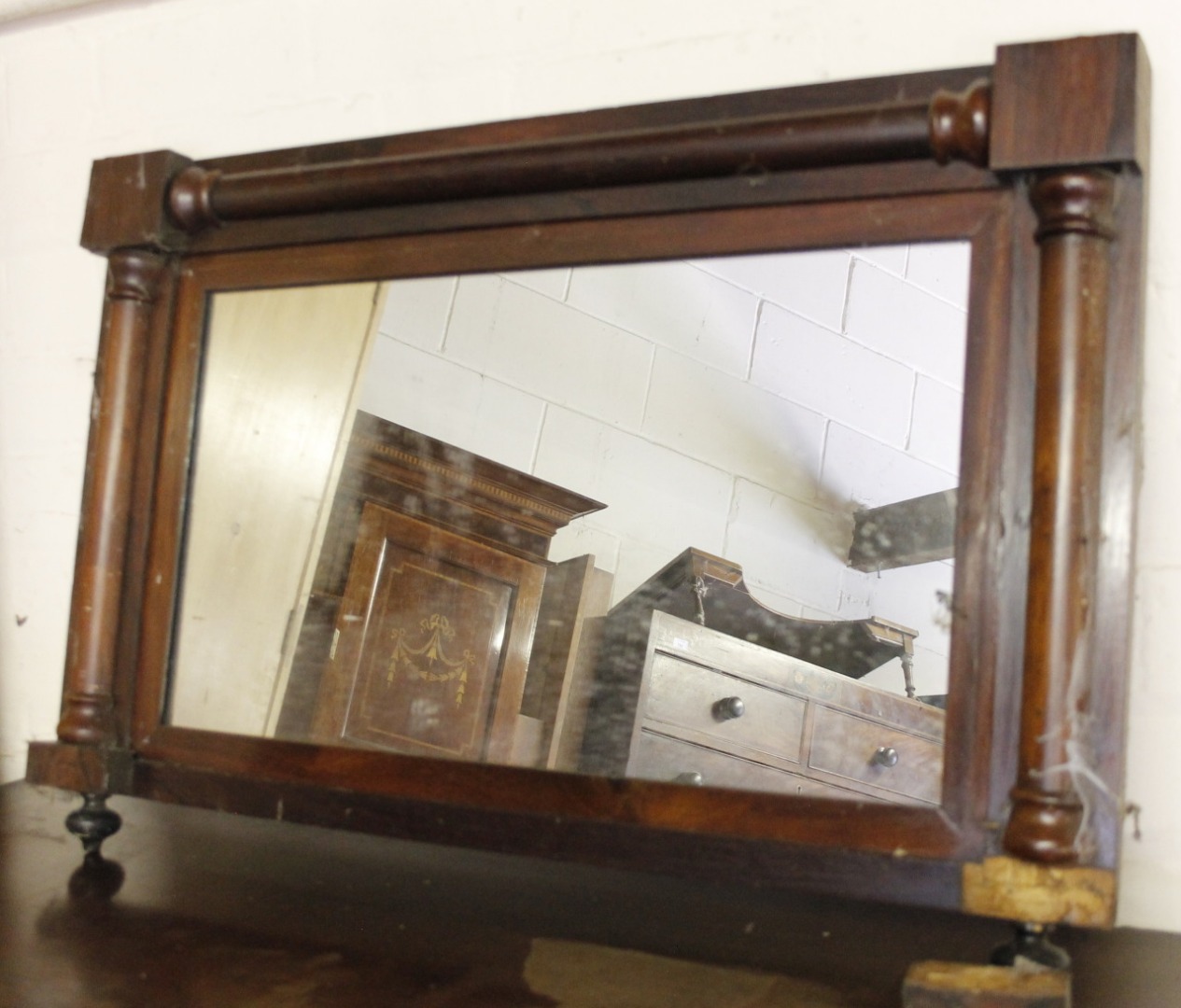 Appraisal: An early thC rosewood framed mirror the rectangular plain glass