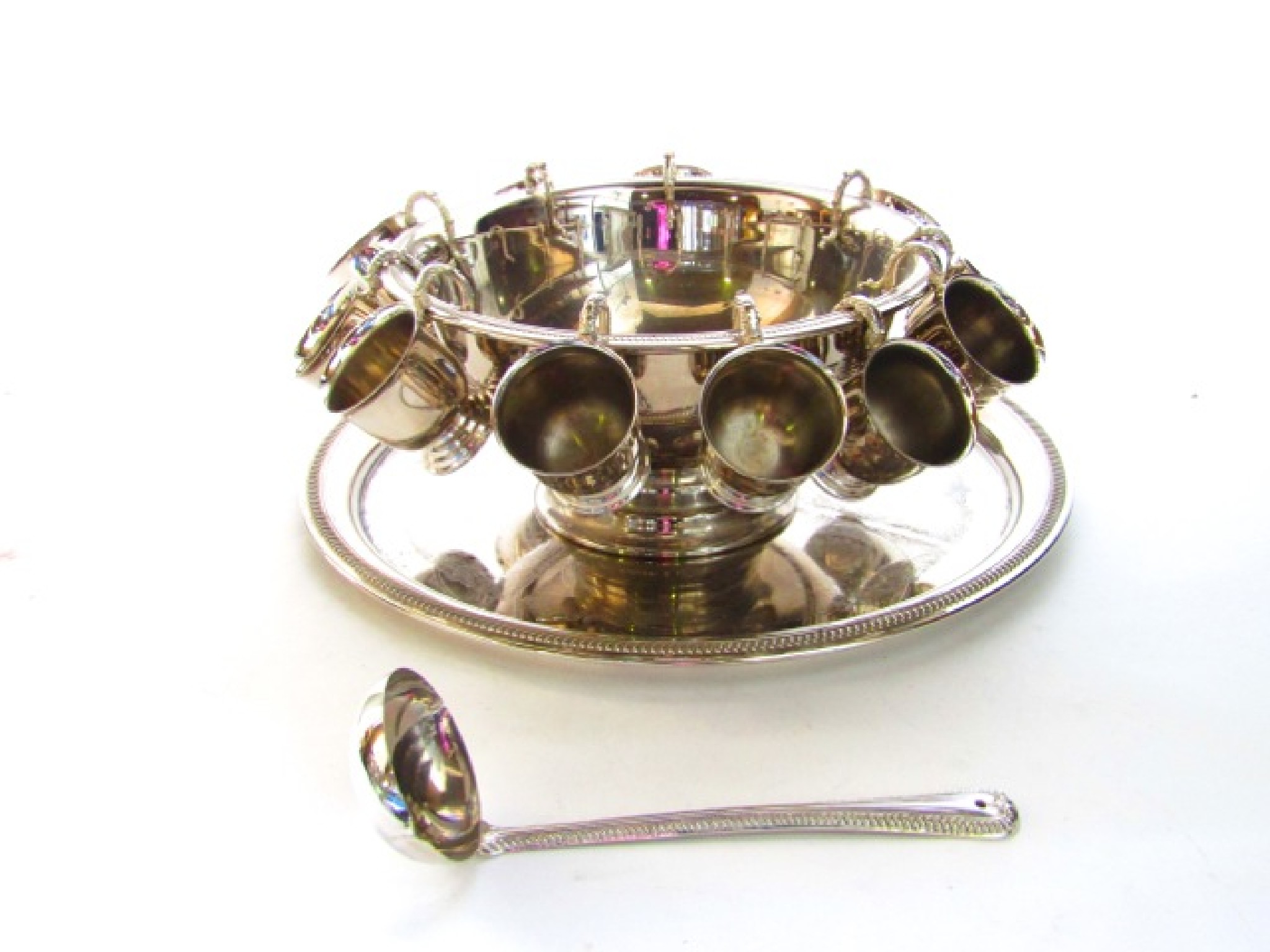 Appraisal: A contemporary silver plated punch bowl with embossed border together