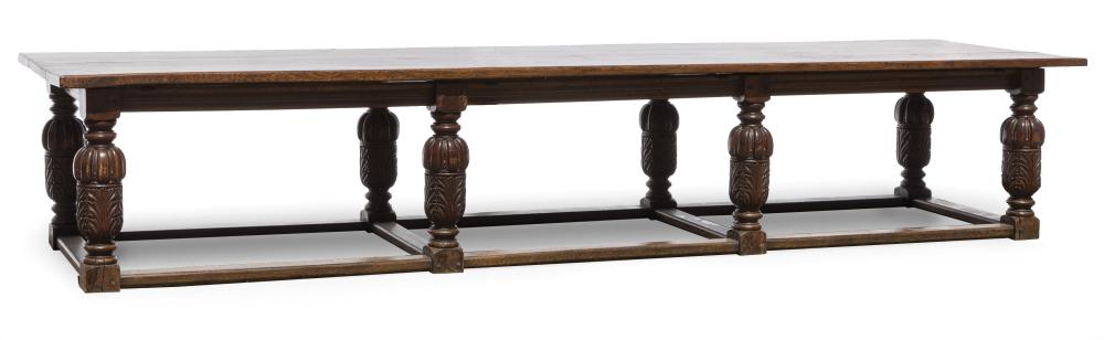 Appraisal: Monumental Continental Baroque-Style Oak Table slab top molded apron robust