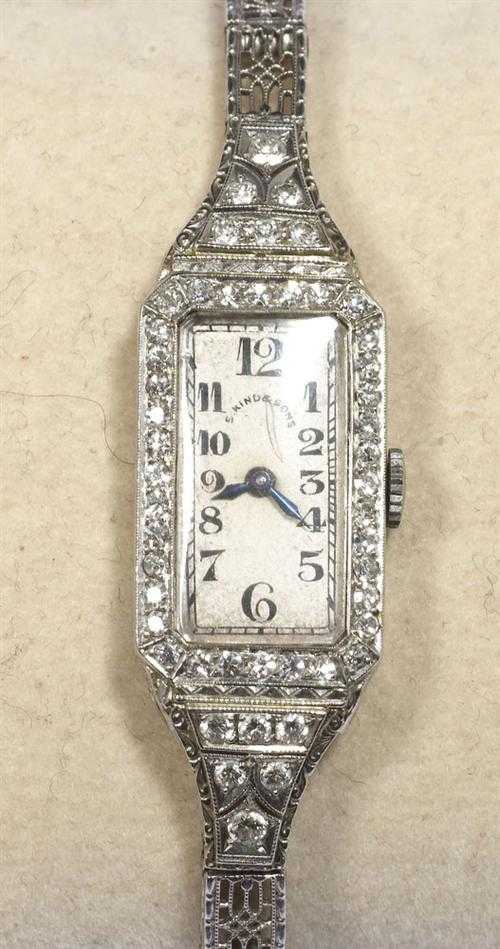 Appraisal: DIAMOND LADY'S WRISTWATCH S KIND SONS LONGINES Art D co