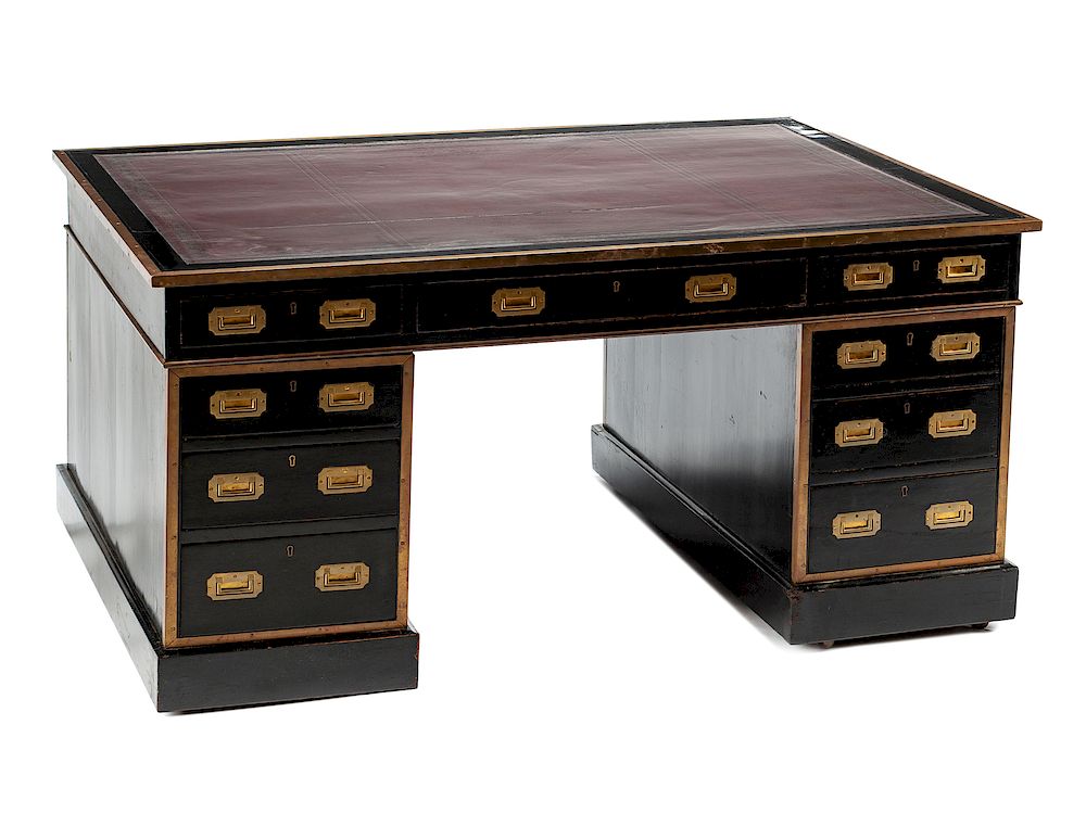 Appraisal: An English Brass Mounted Ebonized Partner's Desk An English Brass