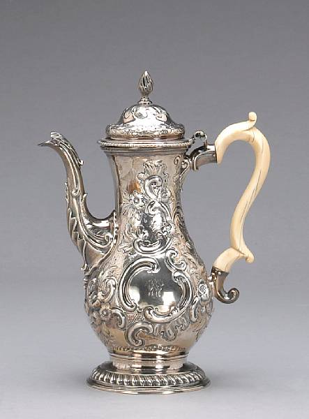 Appraisal: A George III silver coffee pot with ivory handle later