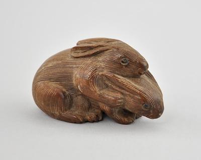 Appraisal: Rabbit Couple Wood Netsuke Carved depicting two loving rabbits with