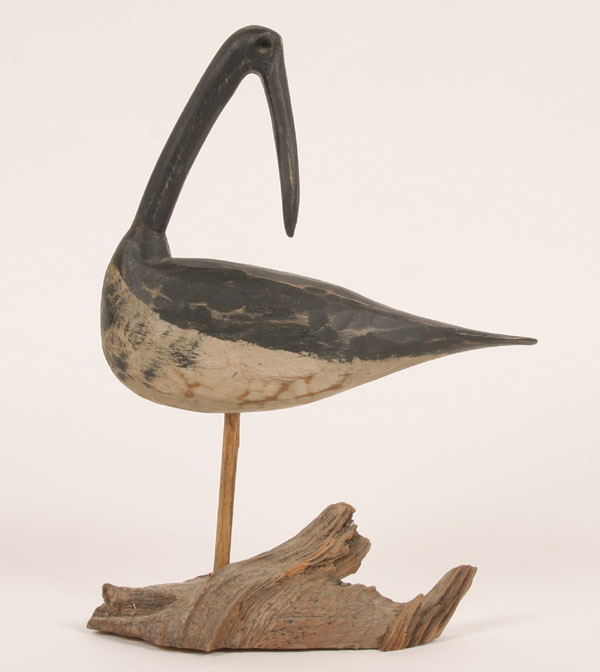 Appraisal: A shorebird chip carved from a root head H