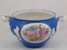 Appraisal: A two handled Russian bowl decorated in blue with floral