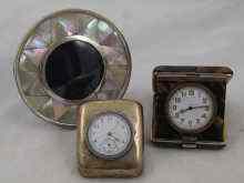 Appraisal: A mixed lot comprising a tortoiseshell and silver travelling clock