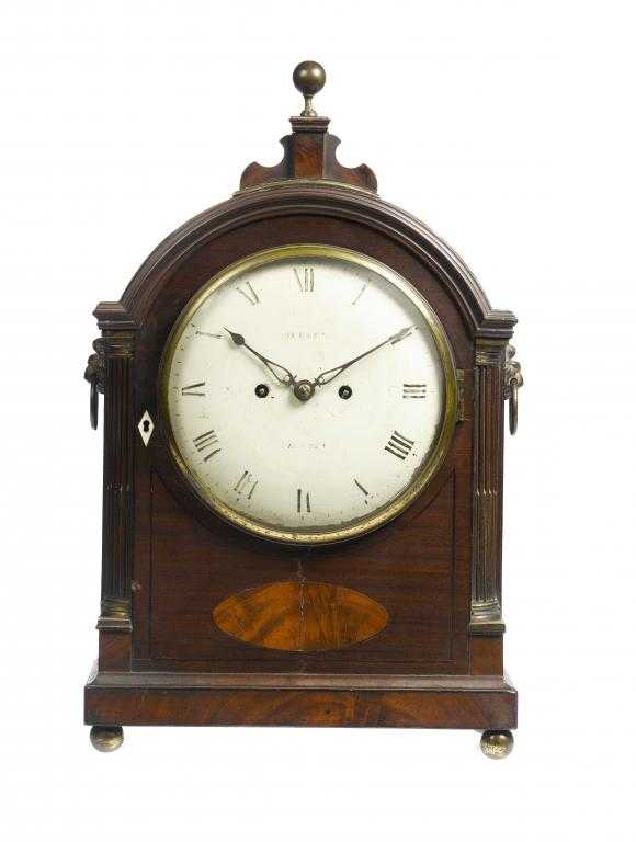 Appraisal: A REGENCY MAHOGANY BRACKET CLOCK signed on the painted dial