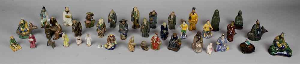 Appraisal: GROUP OF FORTY CHINESE SMALL AND MINIATURE GLAZED POTTERY FIGURES