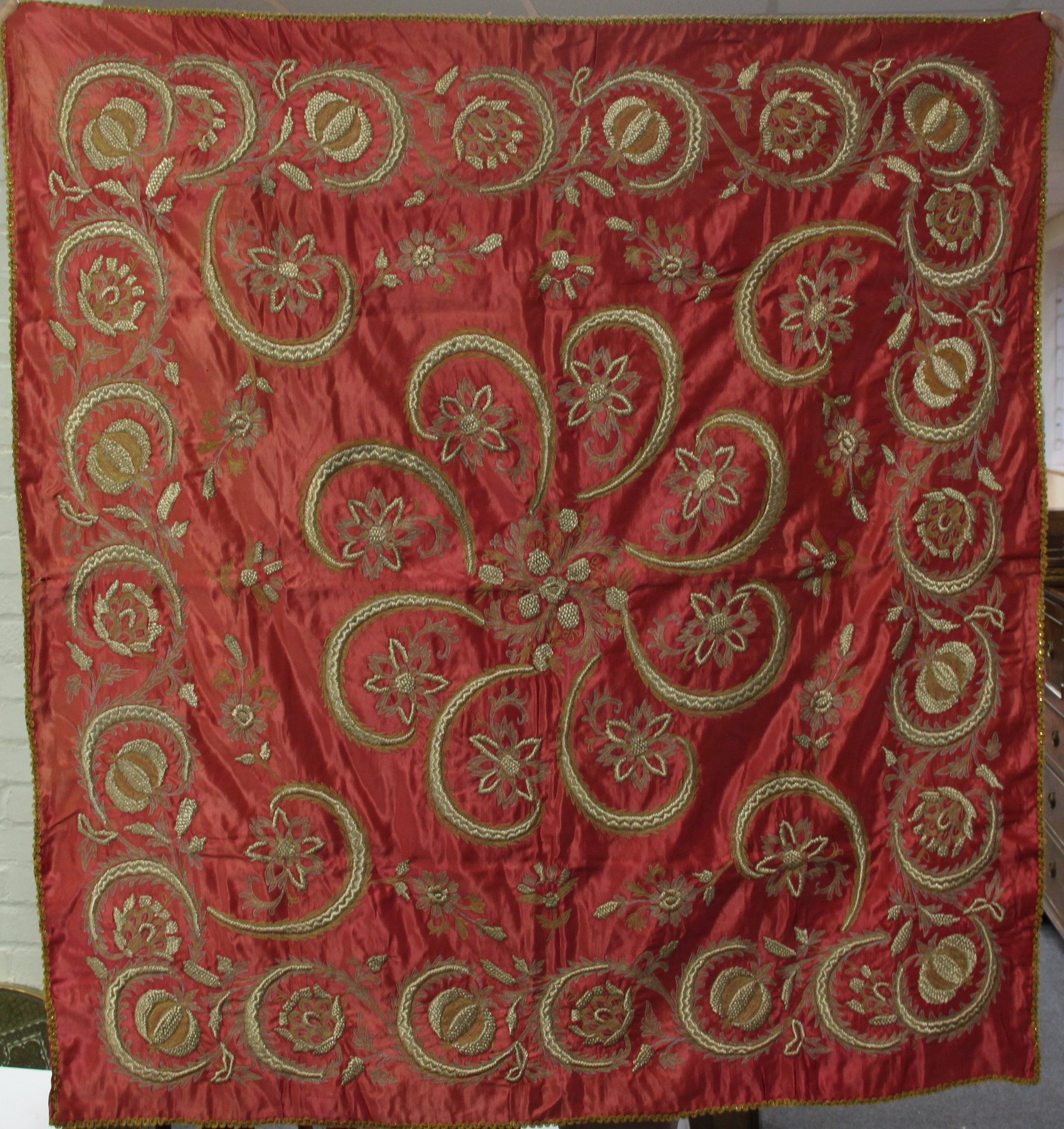 Appraisal: A gilt metal and silver thread silk panel woven flowers