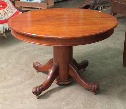 Appraisal: KITCHEN TABLE Oak with a center pedestal and stylized paw