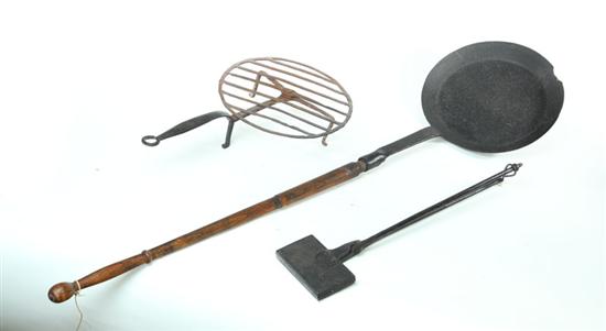 Appraisal: THREE COOKING IMPLEMENTS American th century iron Waffle iron ''l